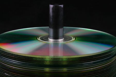 cd dvd pile stack black background computersの写真素材