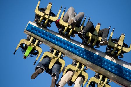 people at carnival, carousel, height, speed, fun, festの写真素材