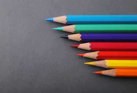 A few pencils on a gray backgroundの写真素材