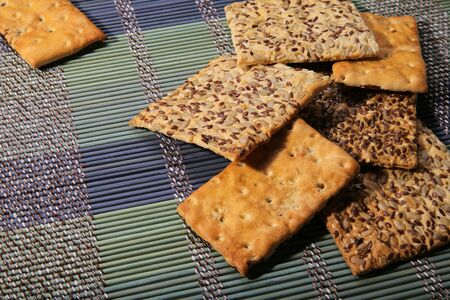 Tasty cookies of different types. Two kinds of biscuit. Cookies on a bamboo mat.の写真素材