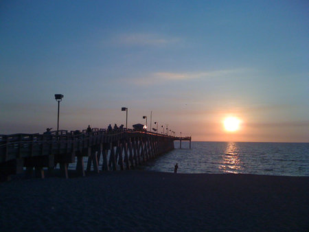 Sunset view on the river beside the bridgeの写真素材