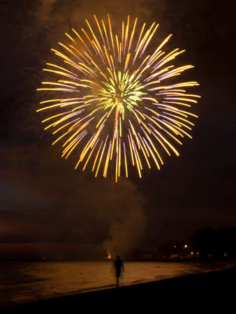 Magnetic fire works in the dark skyの写真素材