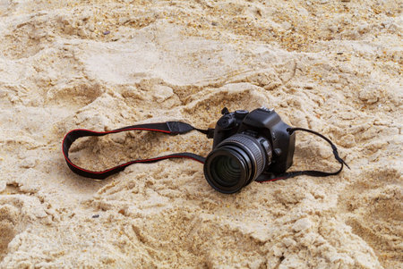 Photo camera in the sandの写真素材