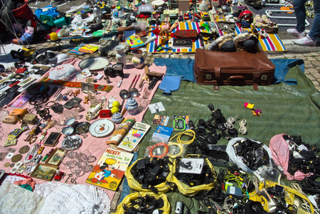 Lisbon, Portugal - May 4, 2013 Flea market goods on a groundのeditorial素材
