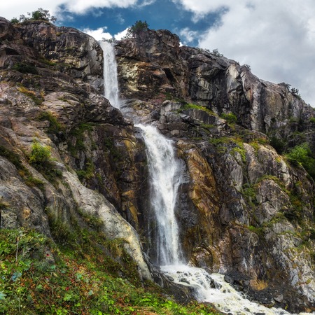 mountain waterfall from Ushba glasier river Georgia Svaneti