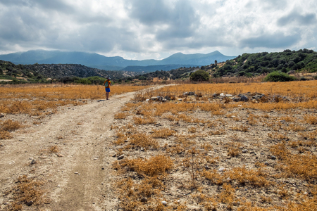 Road trough the desert pasture mediterranean sea dry grassの写真素材