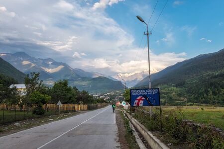 September 2014, Mestia, Georgia - Road to Mestia with European Alley signのeditorial素材