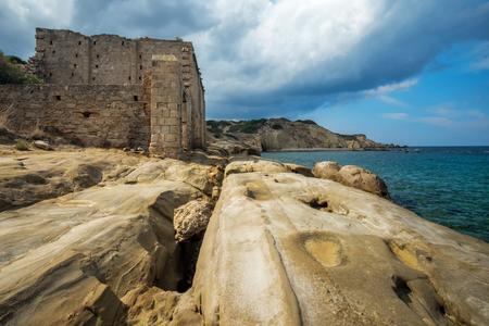 Landscape with ruins and sandstone coastlineの写真素材