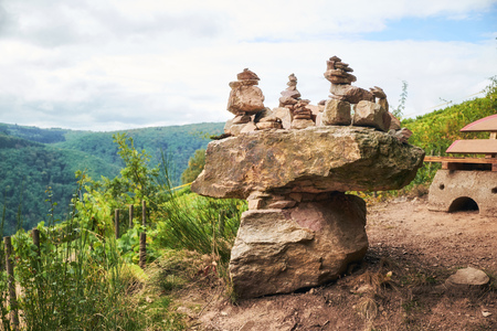 Stone balancing constuction found on a tourist route on Hesse land in Germanyの写真素材