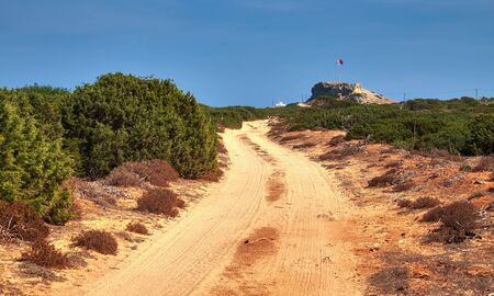 Dirt road leading to Zafer Burnu on eastern edge of Northern Cyprusの写真素材