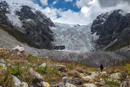 Amazing view to full Lardaad glacier icefall in mountains of Svaneti Georgiaの写真素材