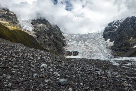 Huge Lardaad glacier icefall view from bottom mountains of Svaneti Georgiaの写真素材