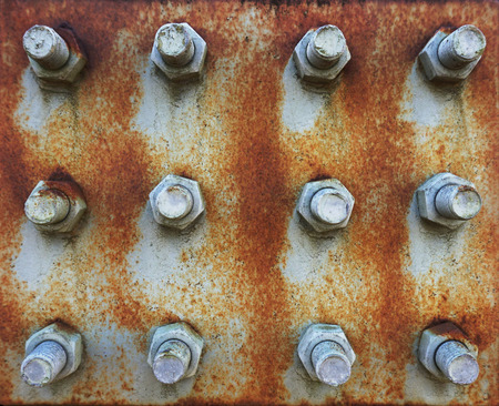 Texture of iron plate with screwsの写真素材