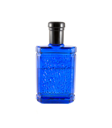 blue bottle of perfume on white backgroundの写真素材