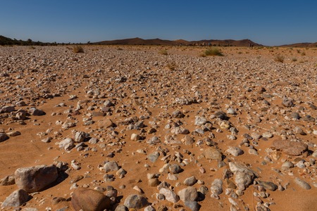 Beautiful Moroccan landscape, Sahara desert, stones against the skyの写真素材