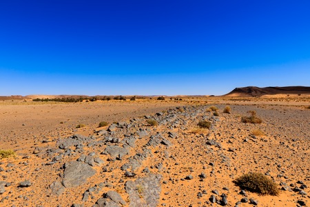 stones in the Sahara desert, Morocco landscapeの写真素材