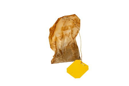 used tea bag on the white background.の写真素材