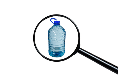 Big bottle of water isolated on a white background, view through a magnifying glassの写真素材