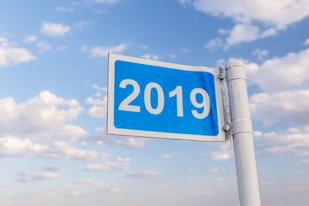 2019 kilometer sign, road sign, blue road sign marking the distance traveled from the beginning of...