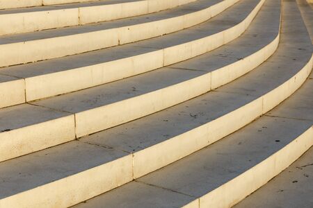 Curved staircase. Stair-step architectural structure. Architectural background.