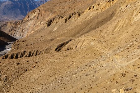 mountain trail in the Himalayas, Panda Khola River, Lupra Village, Lower Mustang Nepalの写真素材