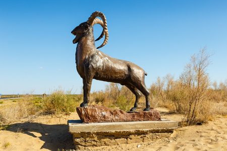 Zhalagash District, Kazakhstan - September 02, 2019: Statue of a mountain sheep, argali, in the steppes of Kazakhstan.のeditorial素材