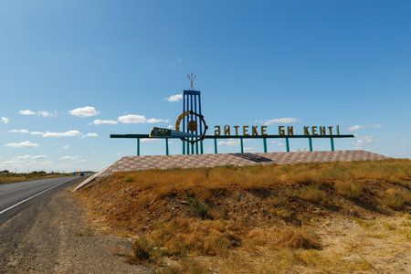 Ayteke Bi, Kazakhstan - August 31, 2019: Entrance to Ayteke Bi in Kazakhstan. A traffic sign welcoming visitors to the village of Aiteke Bi.のeditorial素材