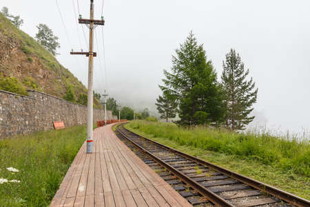 wooden platform. Stopping point at 102 km of the Circum-Baikal Railway. Lake Baikal, Russiaの写真素材
