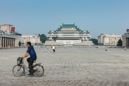 Pyongyang, North Korea - July 29, 2014: Kim Il Sung Square and Grand Peoples Study House with of portraits of two presidents DPRKのeditorial素材