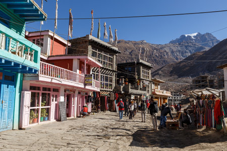 Ranipauwa, Mustang District, Nepal - November 20, 2016: Ranipauwa village street. Tourists on the street of the village.のeditorial素材