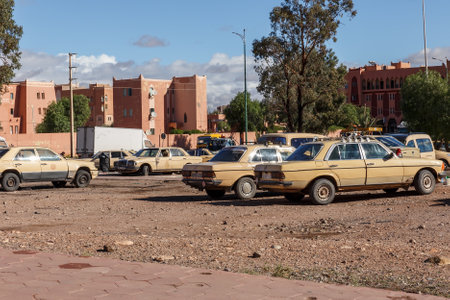 Ouarzazate, Morocco - October 24, 2015: Grand taxi parking. Old Mercedes Benz cars as taxi in Ouarzazateのeditorial素材