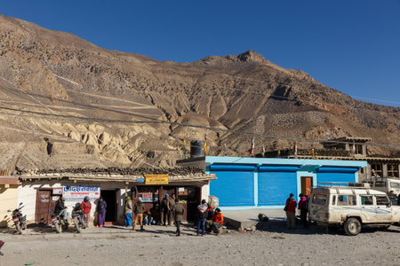 Jomsom, Nepal - November 19, 2016: Jomsom jeep station. People sitting near the store and waiting for the car to be shipped.のeditorial素材