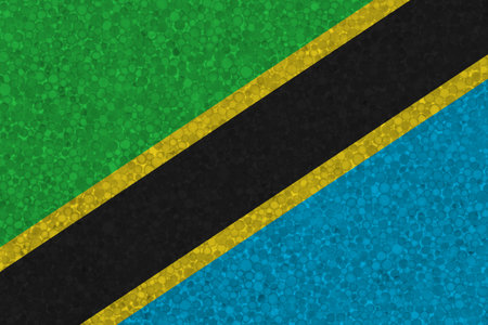 Flag of Tanzania on styrofoam texture. national flag painted on the surface of plastic foamの写真素材