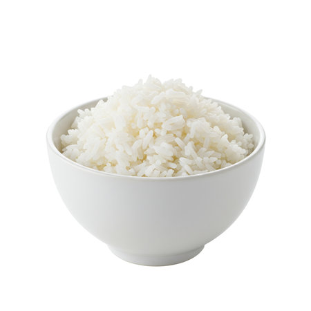 A perfectly cooked bowl of fluffy white rice, isolated on a transparent background and ready for culinary design projects.の素材