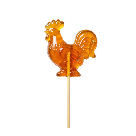 A whimsical, transparent caramel-colored lollipop shaped like a rooster, on a simple wooden stick, perfectly cut out for confectionery designs.の素材