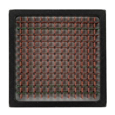 Vintage magnetic core memory module. This retro computer hardware was a primary form of random-access memory for computers.の素材