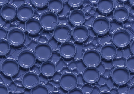Abstract blue background of soap bubbles creating a cellular or molecular structure pattern. A scientific and cosmetic concept wallpaper.の素材