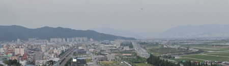 Panorama Gimhae cityscape, Gimhae city is in South Korea, Aerial view of building with mountain background, Cityscape background on a beautiful morning time.のeditorial素材