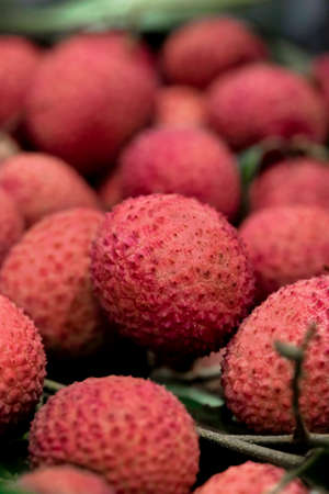 Closeup fresh Lychee fruit (Litchi chinensis Sonn), Thai fruit Linchee  background, Vertical Picture.の写真素材