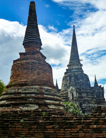 Stupas lined up at the Ayutthaya archaeological site in Thailandの写真素材