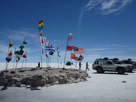 Flags of countries around the world next to Playa Blanca at Uyuni salt lake in Boliviaのeditorial素材