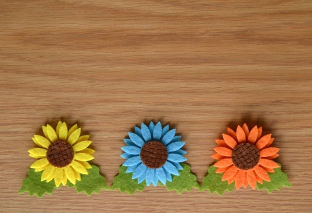 Colorful flowers on wooden rustic backgroundの写真素材