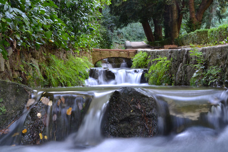 Small waterfall in a riverの写真素材