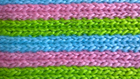 Texture of knitting wool in blue, green and pink colorsの写真素材
