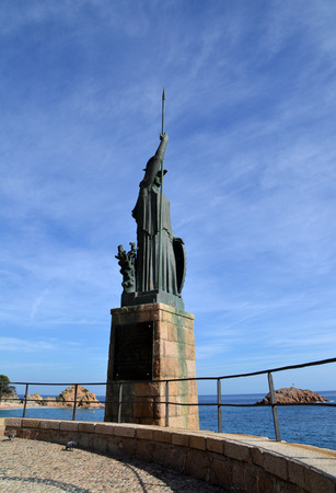 TOSSA DE MAR, SPAIN - OCTOBER 16: Monument to Minerva in Tossa de Mar, Spain on October 16, 2014. Sculpture designed by Frederic Mares i Deulovol in 1974.のeditorial素材