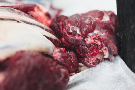 Fresh red meat cut on a wooden cutting boardの写真素材