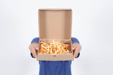 Happy customer asian man excited expression opening and holding box feeling surprise and...