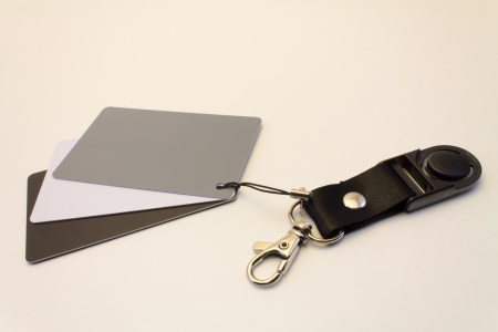 A photographers grey card set, with a white card, a black card, and a middle 18  grey card の写真素材