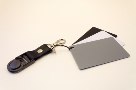 A photographers grey card set, with a white card, a black card, and a middle 18  grey card の写真素材