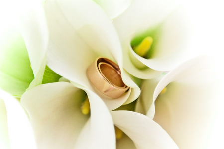 Wedding rings inside the bride's bouquetの写真素材